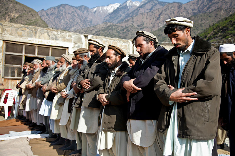 Afghan men praying in Kunar.jpg