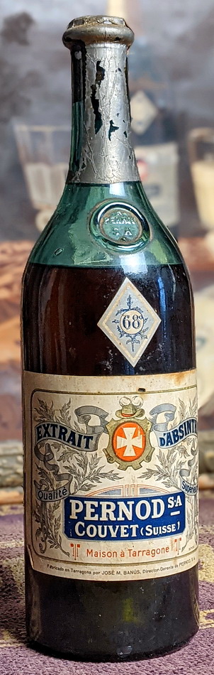 Extrait d'Apsinthe бутылка со штампом Pernod SA, расширяющийся крест на этикетке