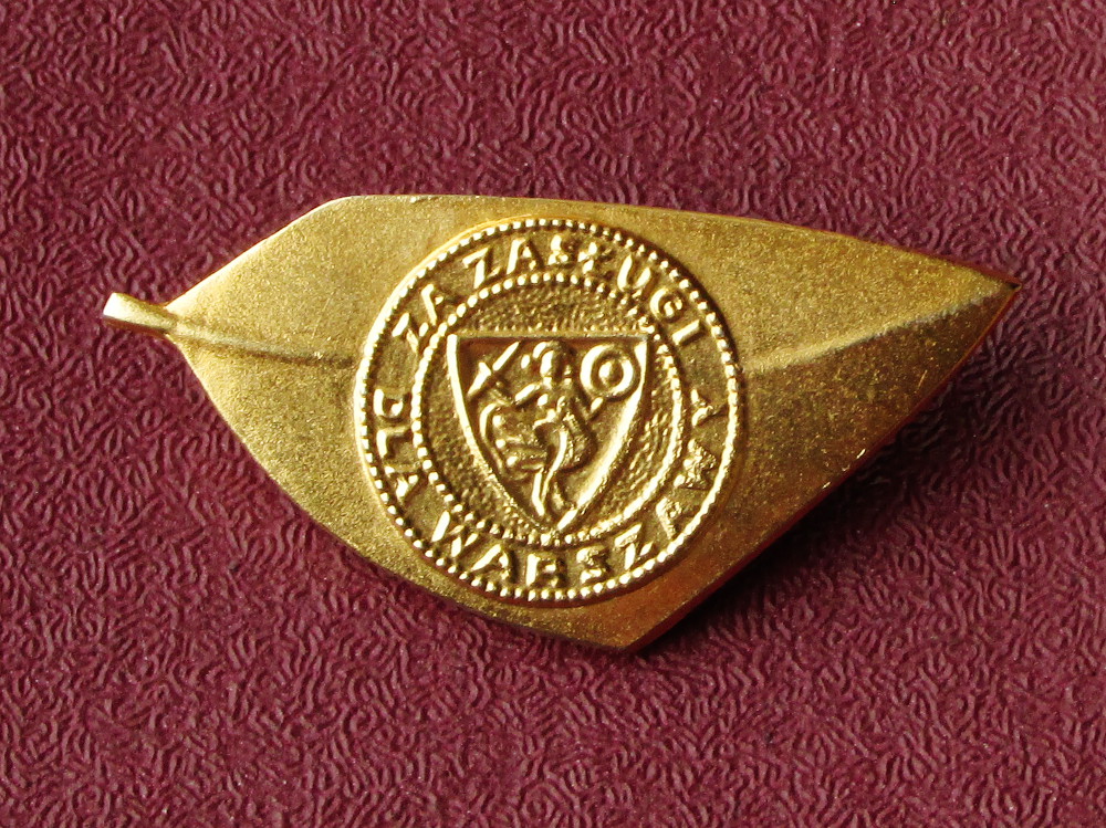 Золотой почётный знак «За заслуги для Варшавы»